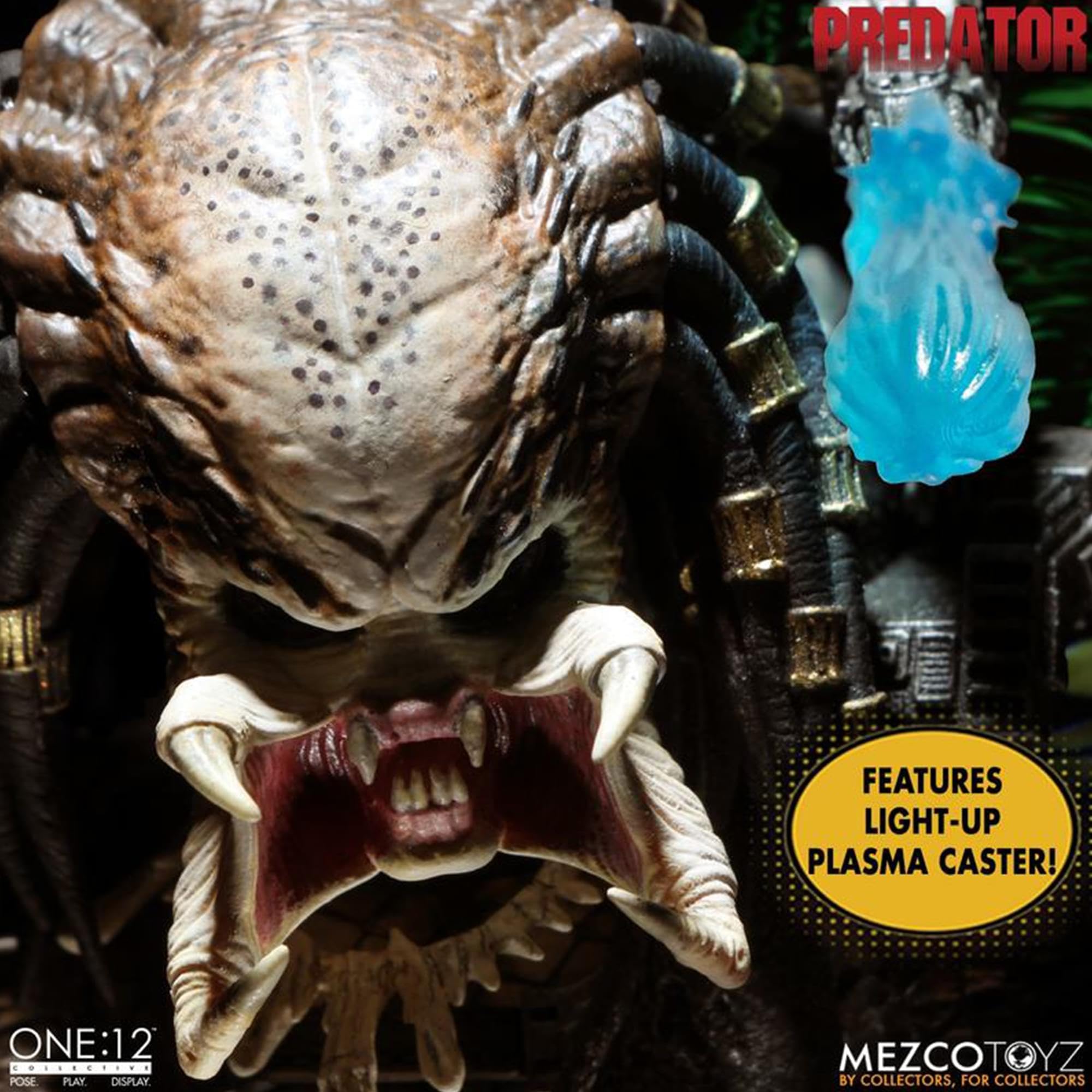 Predator action figure with light-up plasma caster feature, Mezco Toyz brand visible