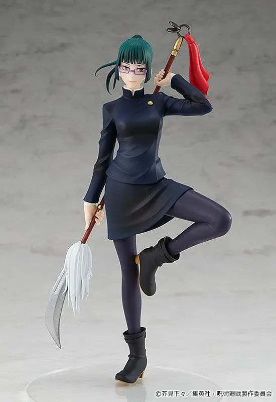 The Good Smile Company Jujutsu Kaisen: Maki Zen’in – Pop Up Parade figure features Maki in glasses, green hair in a bun, dark school uniform, wielding a pole weapon with white accents and red cloth, posed standing on one leg.