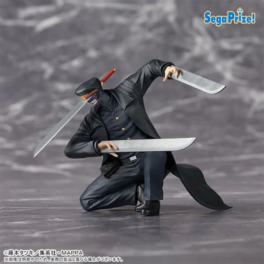 The SEGA Chainsaw Man PM Perching: Samurai Sword PVC Statue (12 cm) features a masked character in a black uniform, kneeling with crossed swords and dramatic details. The SegaPrize! logo accents this striking collectible figure.