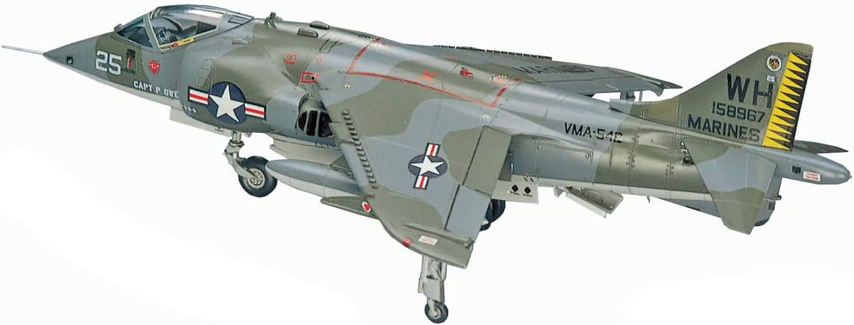 A gray AV-8A Harrier with U.S. Marines markings and a striped tail, landing gear down, is perfect inspiration for building the Hasagawa Hasegawa 1/72 AV-8A Harrier B-Series Model Kit.