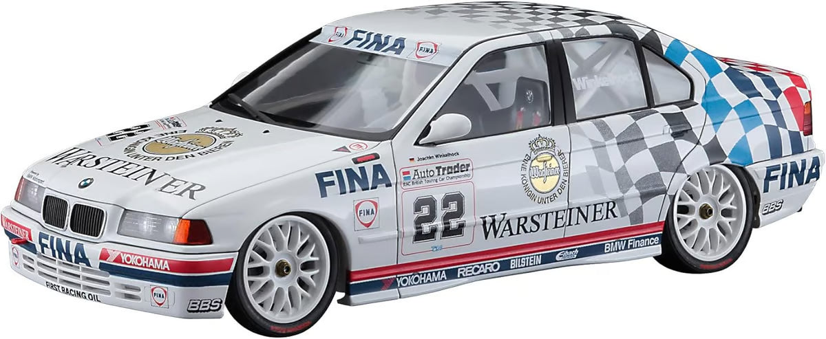 The Hasagawa Hasegawa 1/24 Team Schnitzer BMW 318i 1993 BTCC Champion Model Kit features a white race car with blue/red accents, Warsteiner, Fina, Yokohama logos, number 22, checkered flag pattern—a tribute to Team Schnitzer’s BTCC victory.