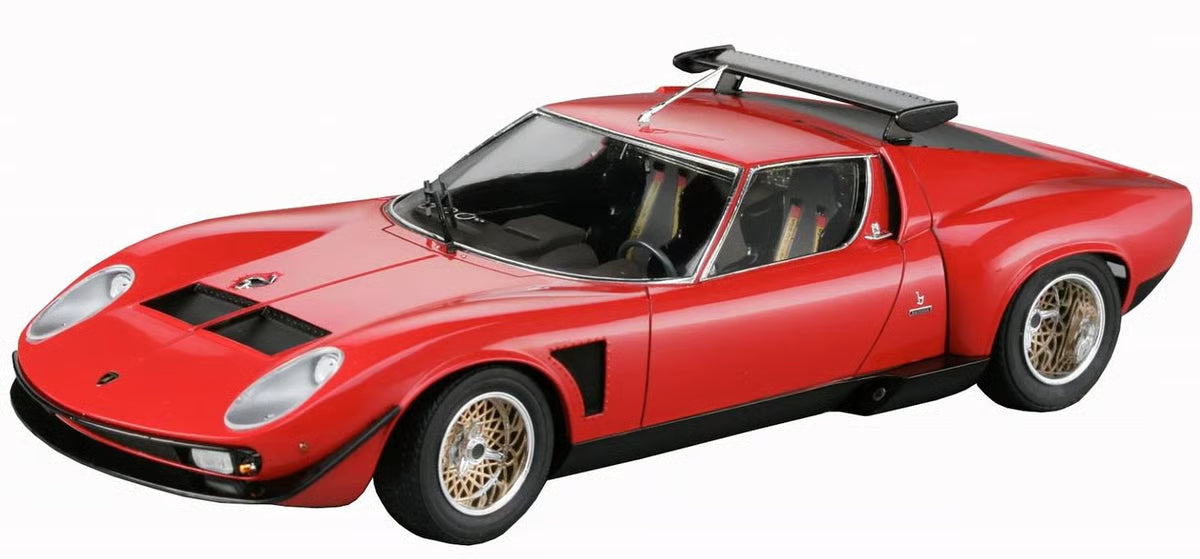 A stunning Hasegawa 1/24 Lamborghini Jota SVR (1975) model kit featuring a red vintage sports car with gold wheels, black side vents, and a rear spoiler, shown from the front-side against a white background.