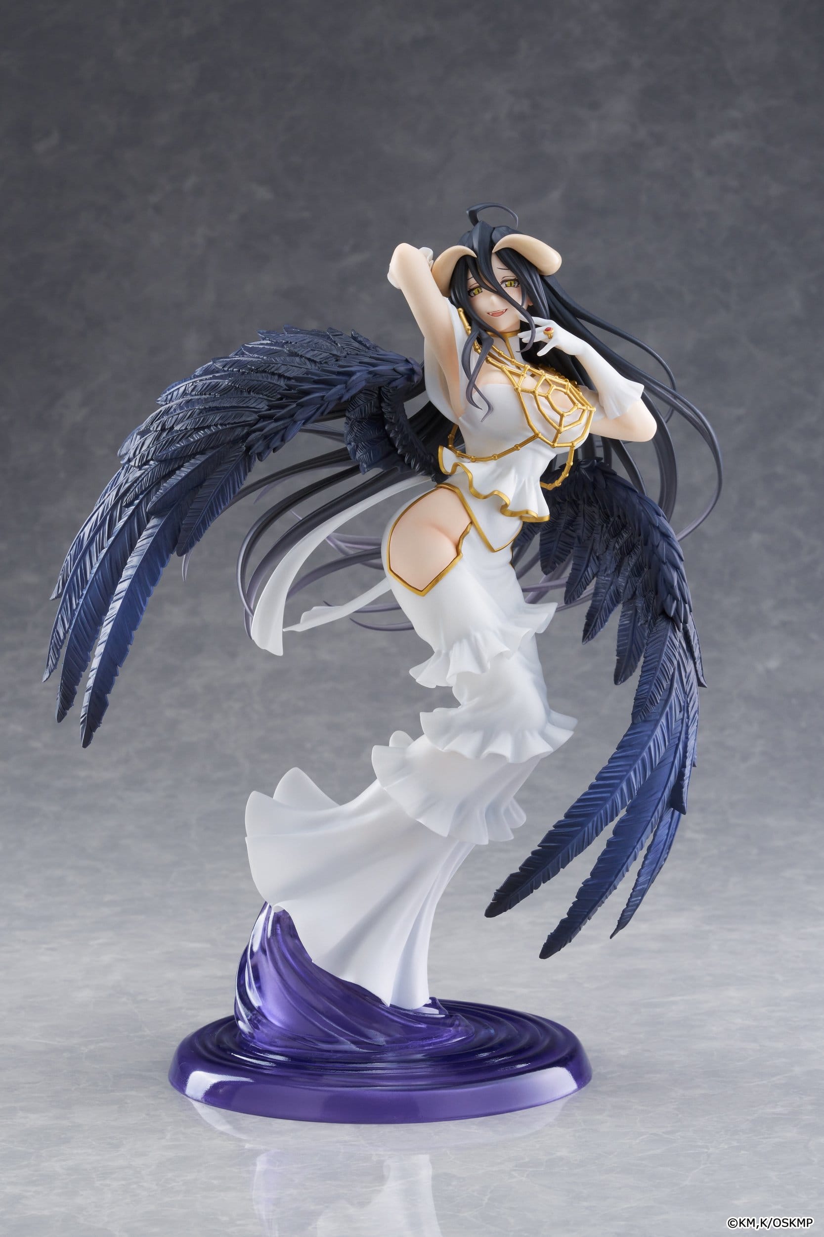 The Taito Overlord T-most Albedo Pure White Devil Version PVC Statue (29 cm) features the fantasy character Albedo with long black hair, black wings, and a flowing white dress, elegantly posed on a purple and white base.