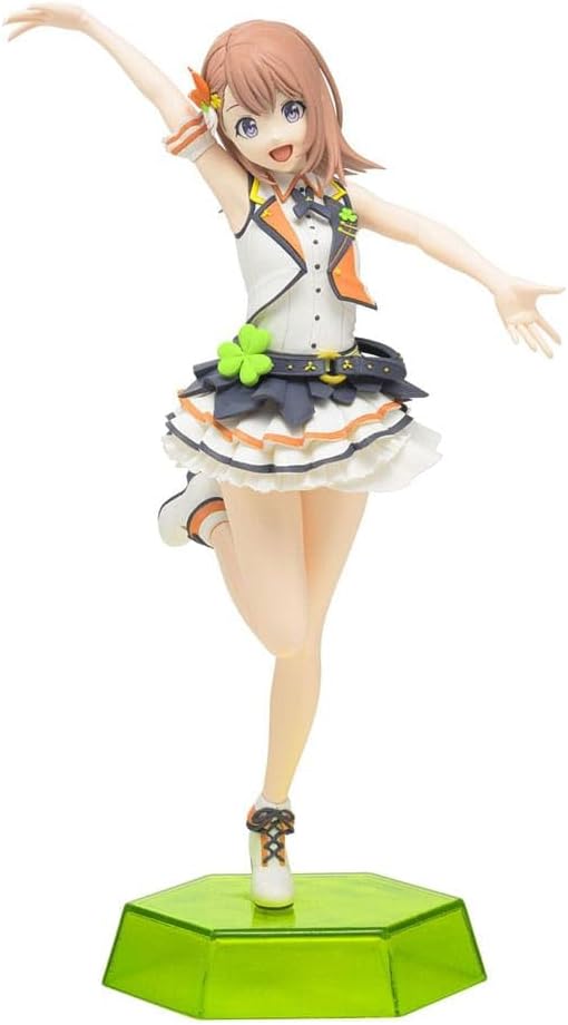 The SEGA Hatsune Miku: Colorful Stage! Desktop x Decorate Collections Hanasato Minori PVC Statue (16 cm) features Minori in a white, navy, and orange frilled outfit, standing on one leg with arms outstretched atop a green hexagonal base.