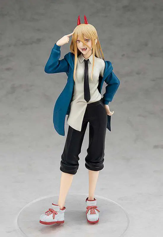 The Good Smile Company POP UP PARADE: Chainsaw Man – Power figure features Power, the smiling anime girl with long blonde hair, red horns, and fangs, in her blue jacket and red sneakers, playfully posing with one hand on her head.